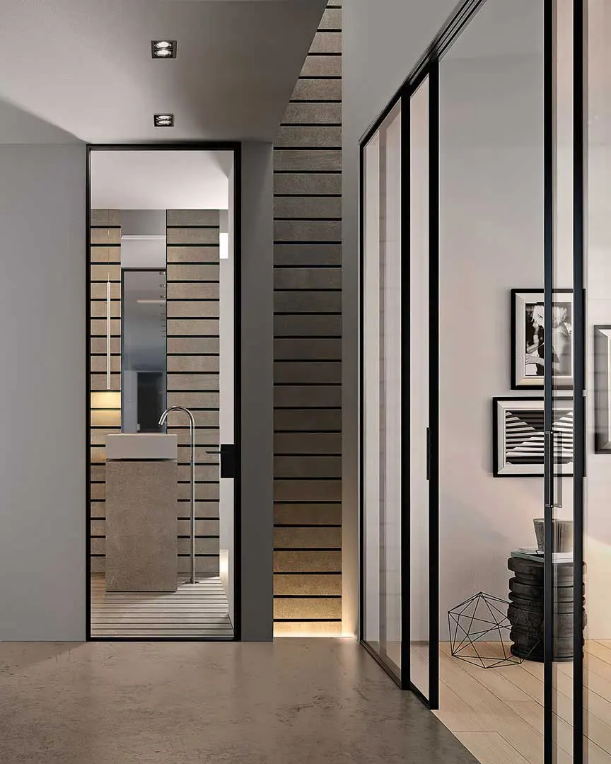 Puerta practicable, acabado NEGRO TX con cerradura magnética. Puerta corredera con fijo, acabado NEGRO TX con tirador tipo CAVE adherido.